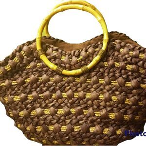 Vintage boho resort  woven straw hand bag.